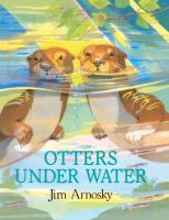 Otters under water /